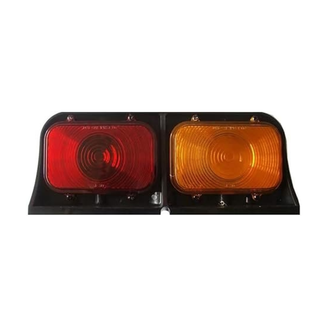 red amber trailer light on white background