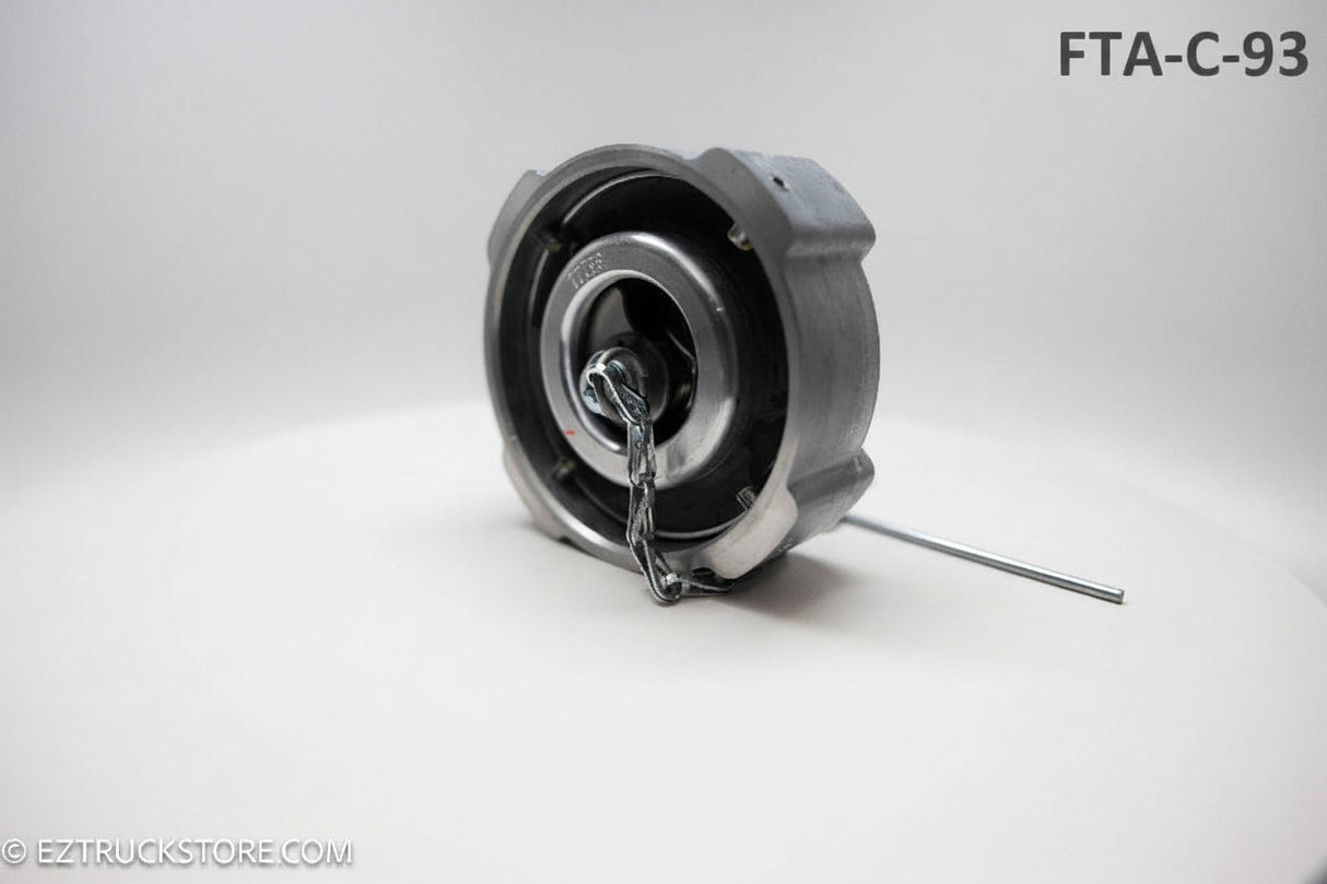 view from below of a locking fuel cap for a freightliner truck