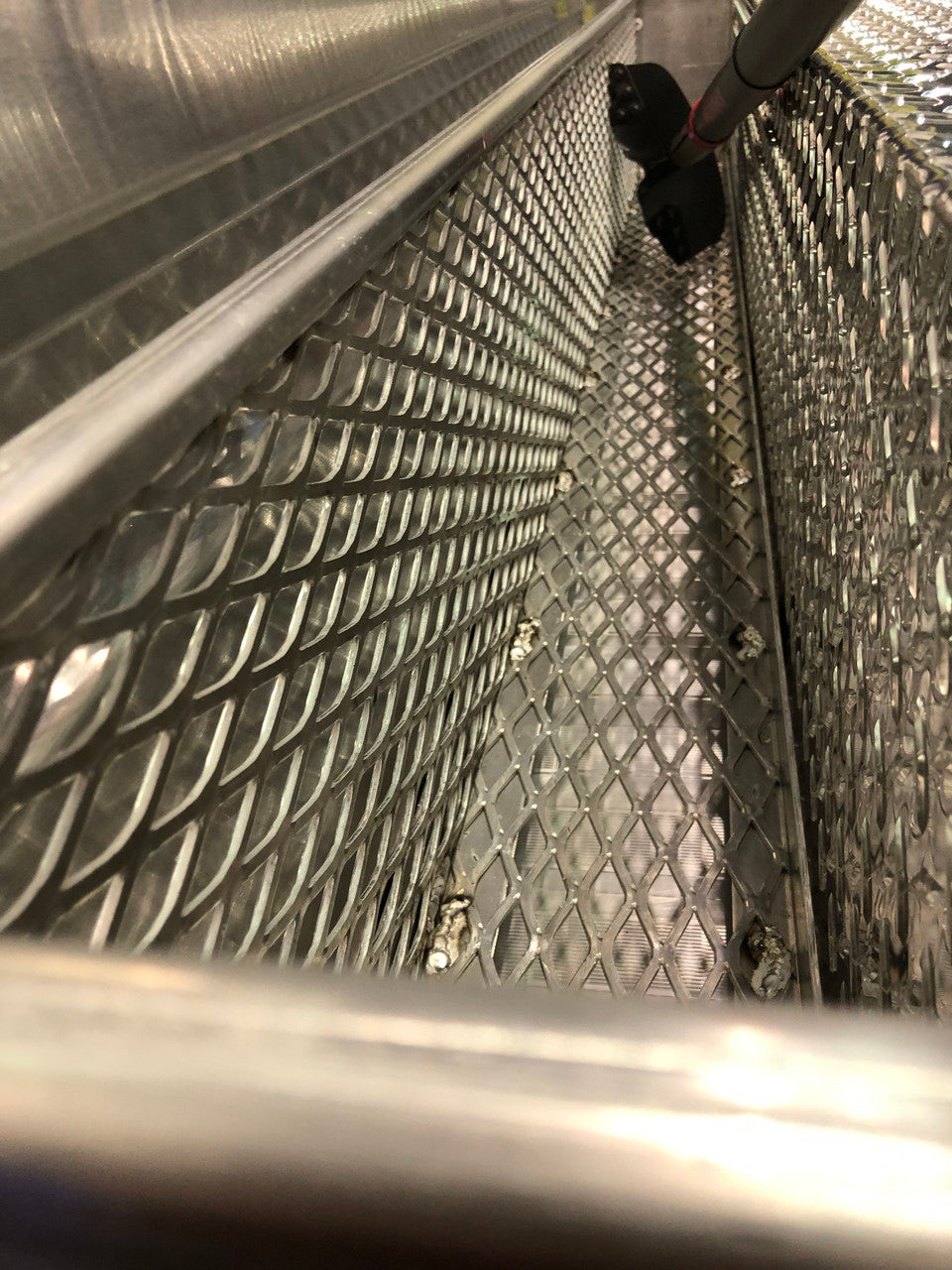 Close up for Mesh basket on tool box for commercial trucks
