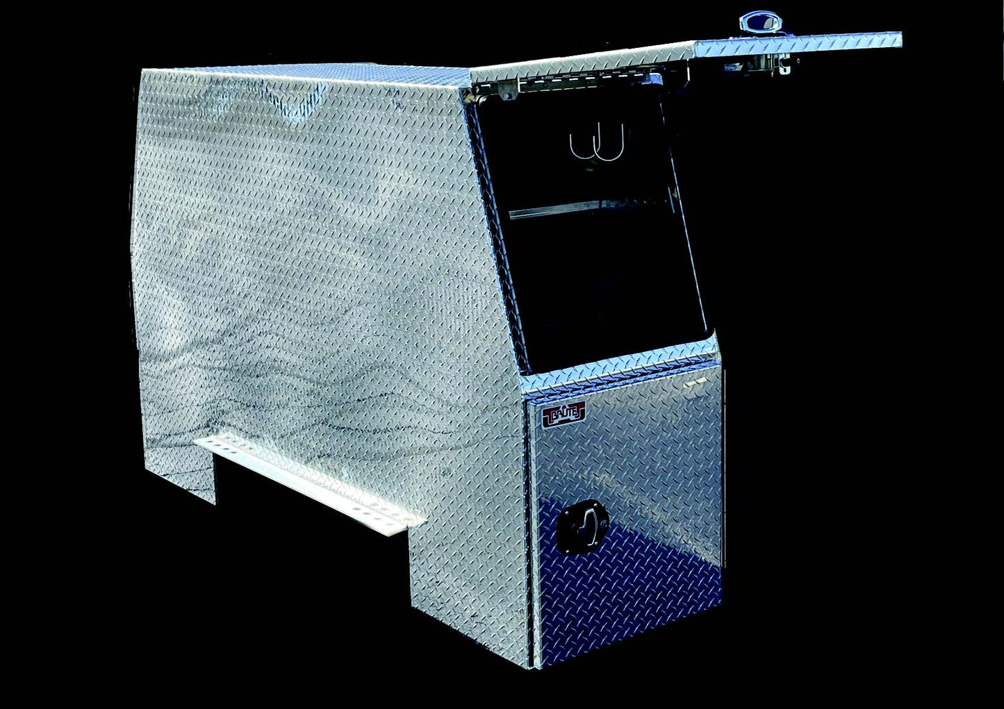 Metallic toolbox with diamond plate pattern on a black background