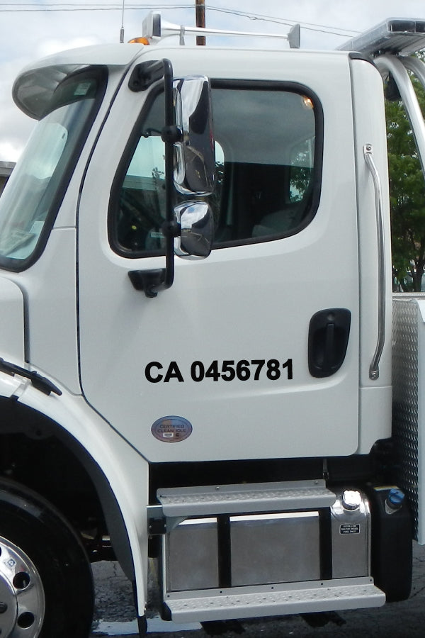 white truck with CA Number Decal on the side