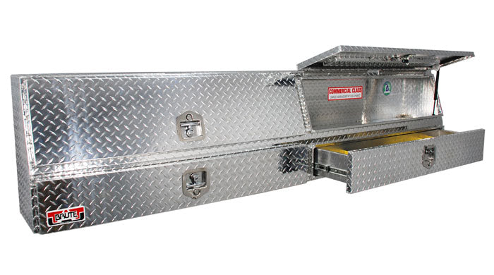 Large metallic toolbox with open lid on a white background