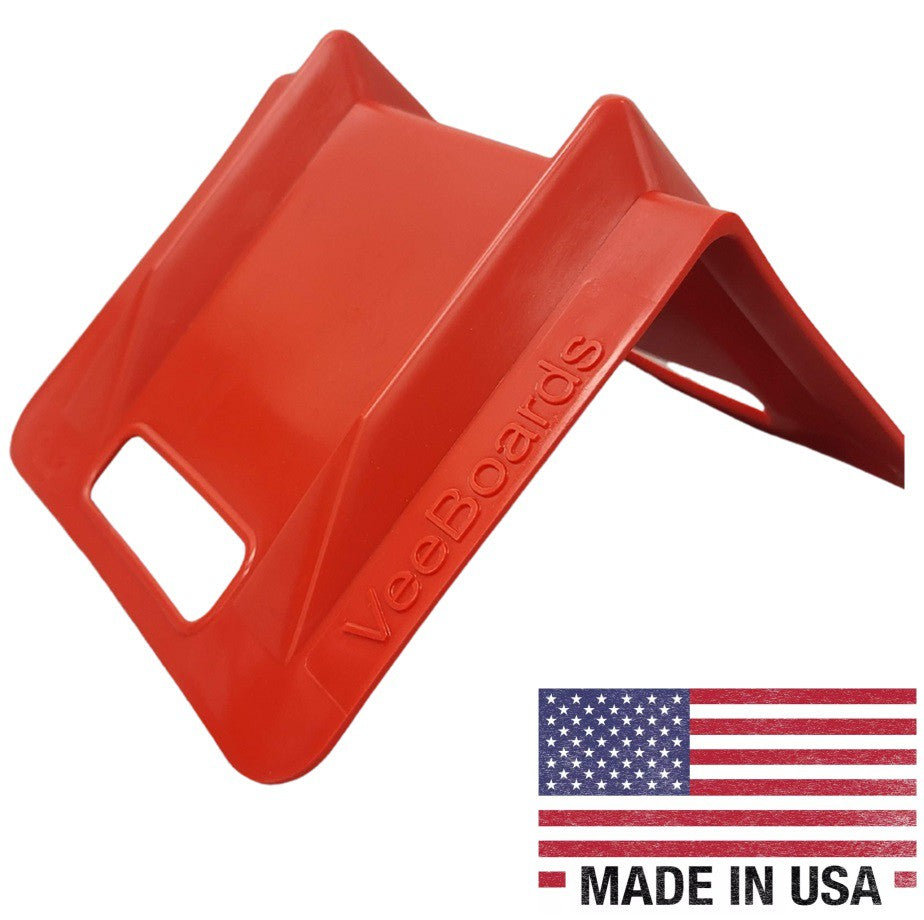 A red VeeBoards cargo control device displayed with a 'Made in USA' label.