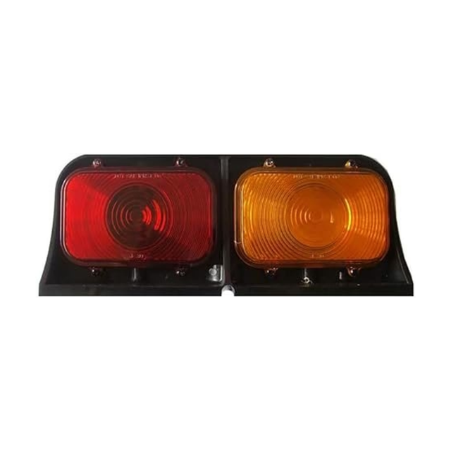 red and amber trailer light on white background