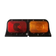 red amber trailer light on white background