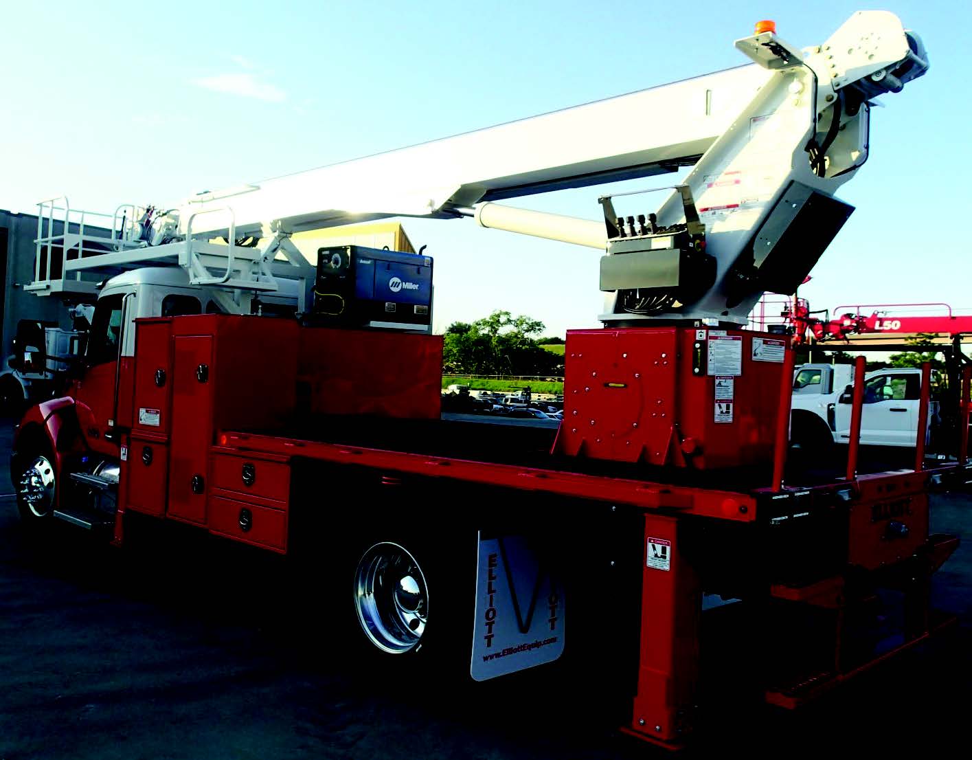 Crane work truck with crossbox installed and finished in red