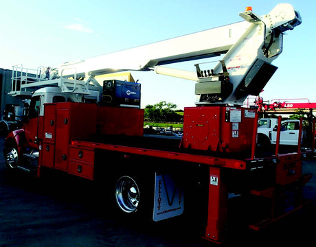 Crane work truck with crossbox installed and finished in red