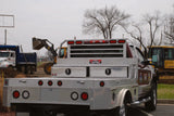 Truck with aluminum diamond plated drawers across bed