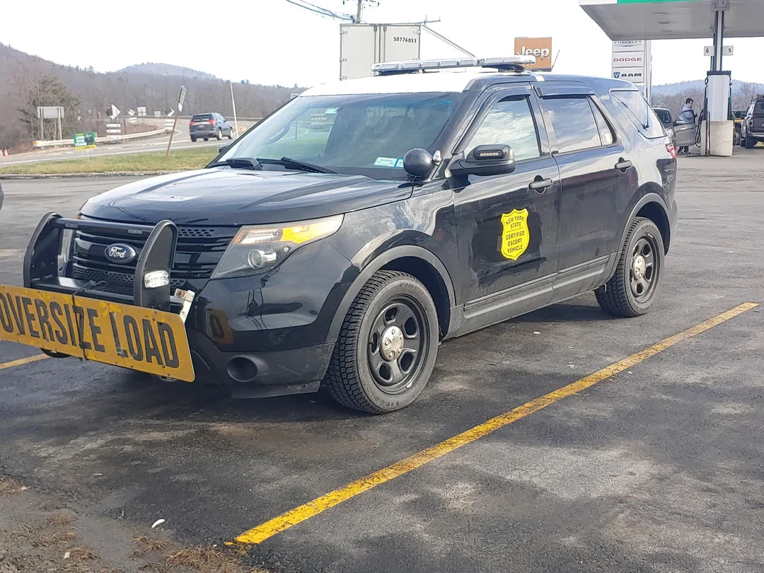 Decals in use on escort vehicle for New York State