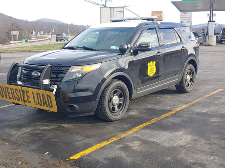 Decals in use on escort vehicle for New York State