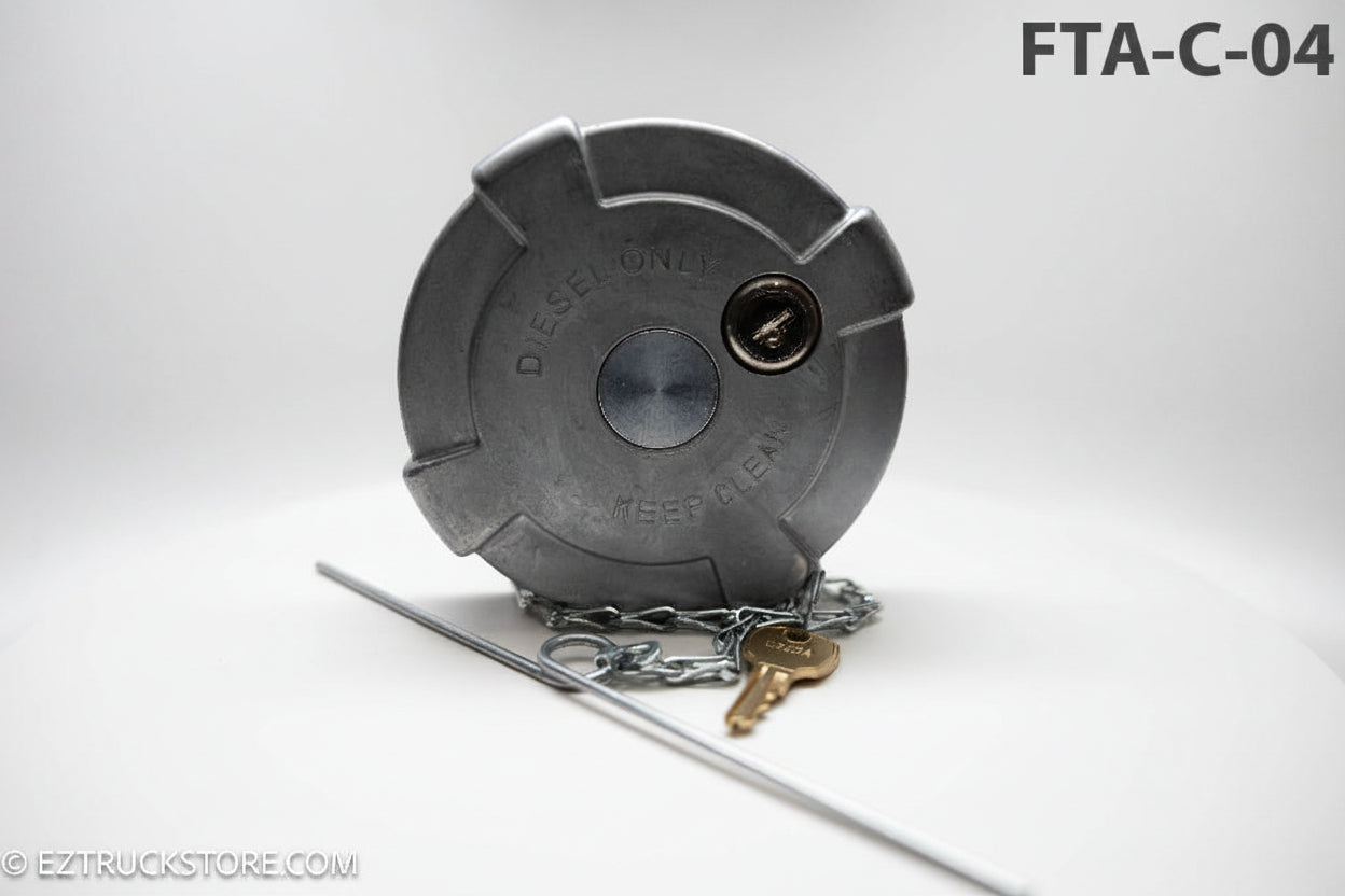 Gray fuel cap with chain and key on a white background