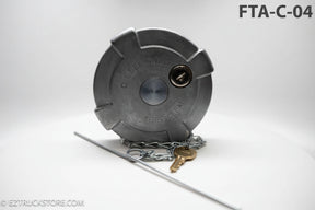 Gray fuel cap with chain and key on a white background