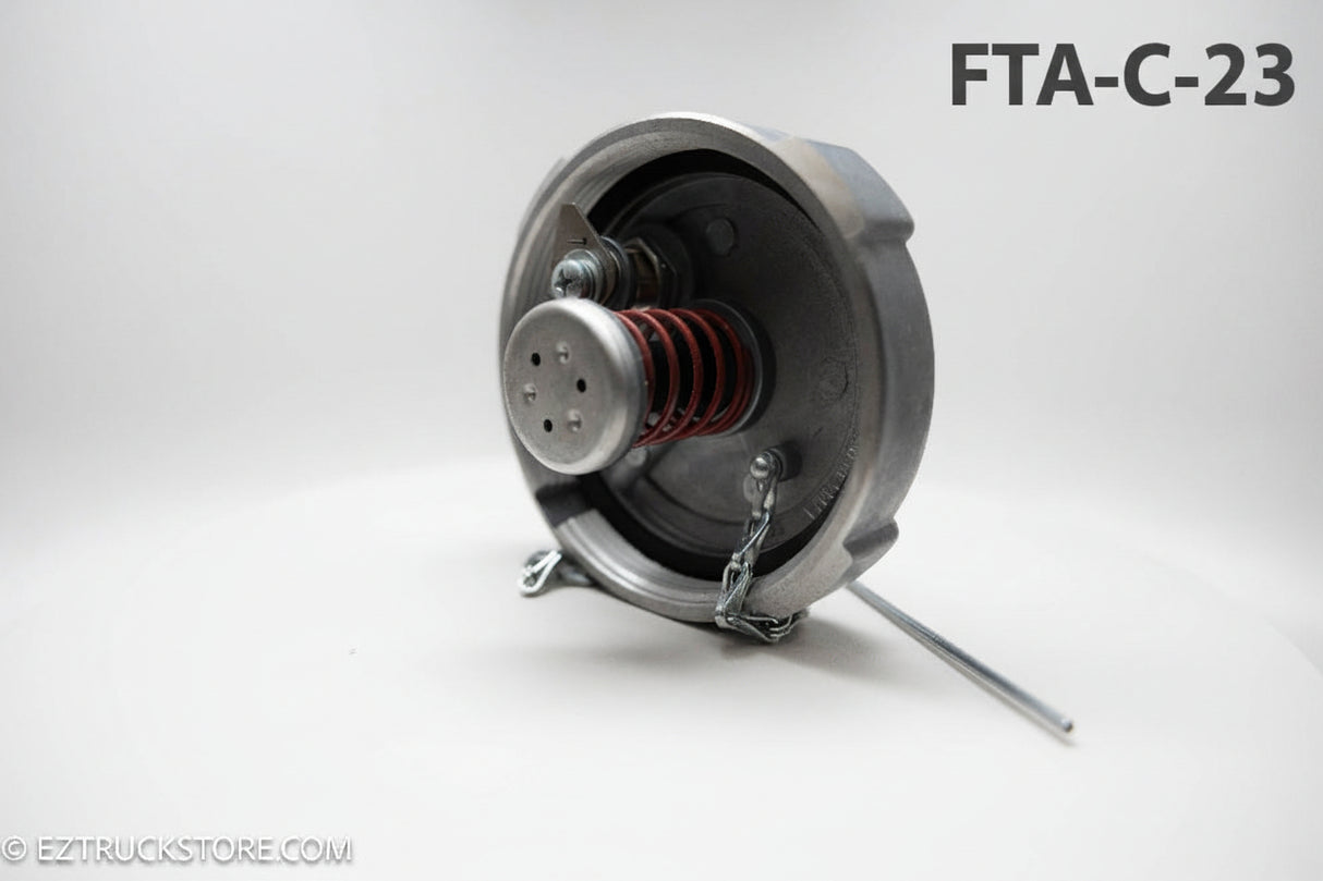 picture of the underneath of 4 inch fuel cap with lock