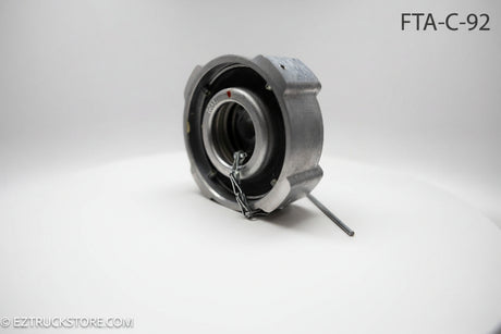 Aluminum fuel cap with chain on a white background