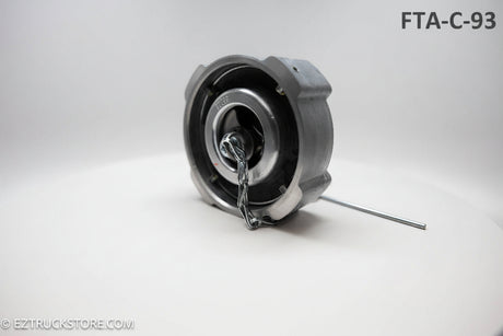 view from below of a locking fuel cap for a freightliner truck