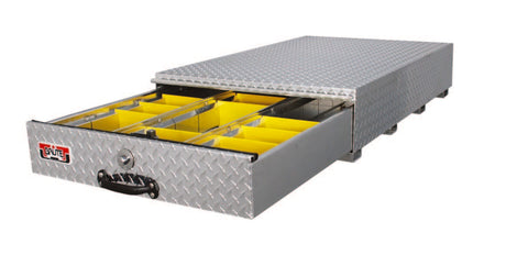 pull out tool box for truck beds made of aluminum diamond plating with yellow dividers for storage