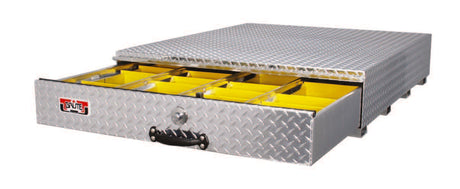 Metal toolbox with yellow interior compartments on a white background