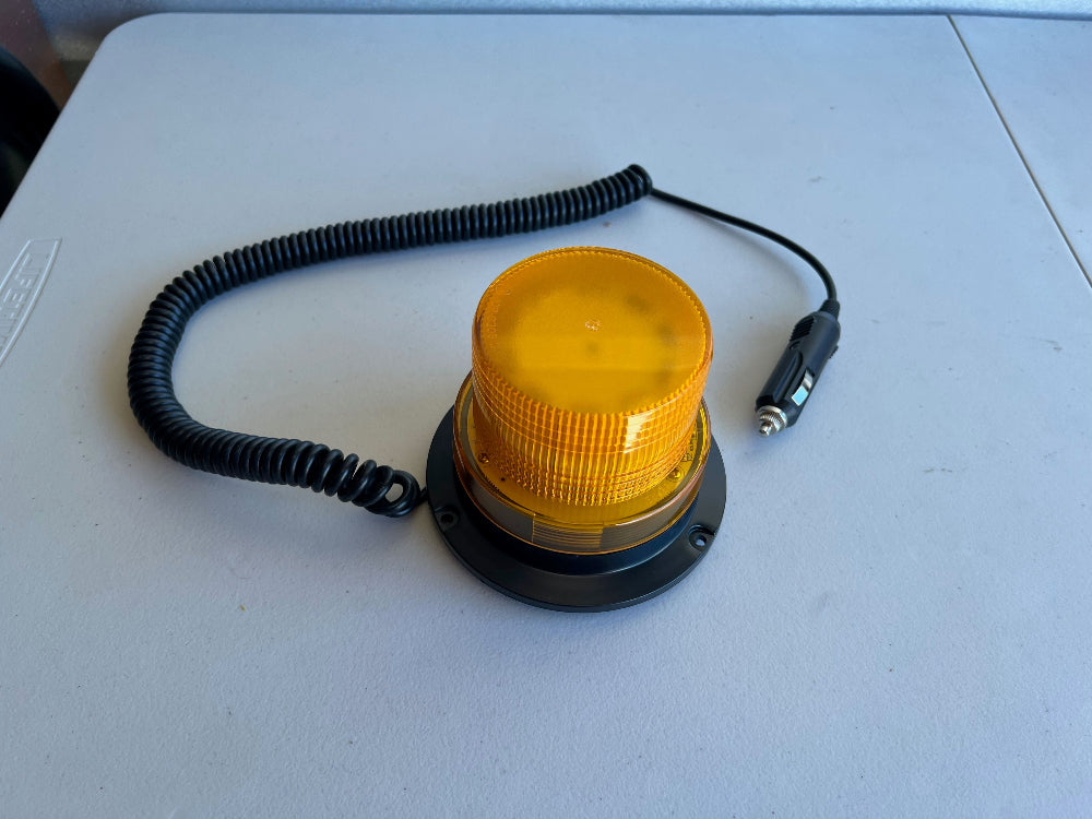 Amber warning light with coiled cable