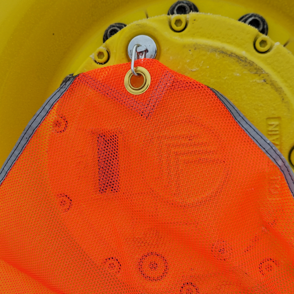 
                  
                    close up of max duty flag on rim with flag mag
                  
                
