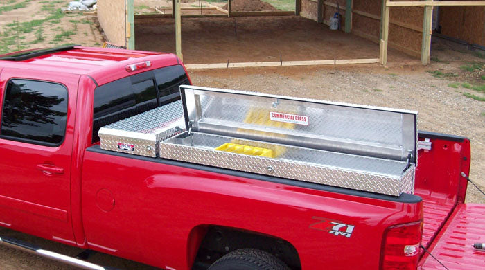 big truck losider installed with crossover tool box 
