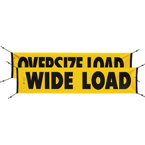 A yellow and black 'Oversize Load Wide Load' banner with bungee cords attached for safety signage.