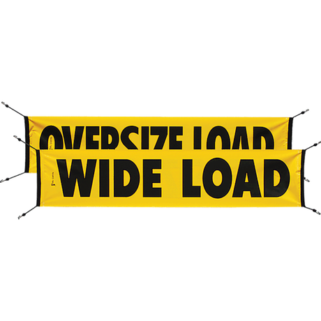A yellow and black 'Oversize Load Wide Load' banner with bungee cords attached for safety signage.