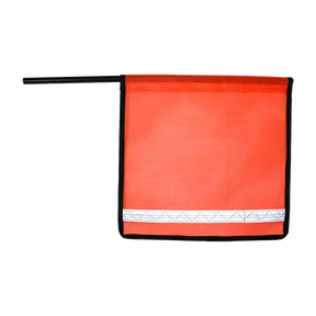 A bright orange staff flag with reflective white stripes and black edge binding, designed for high visibility on roadsides.